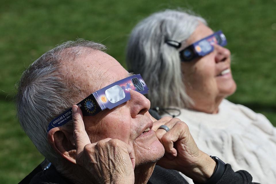 Fran Walsh-77 and Elaine Walsh-80 of Wollaston have never seen a solar eclipse before.

Hundreds gathered on the Thomas Crane Library lawn in Quincy to watch the solar eclipse on
Monday April 8, 2024