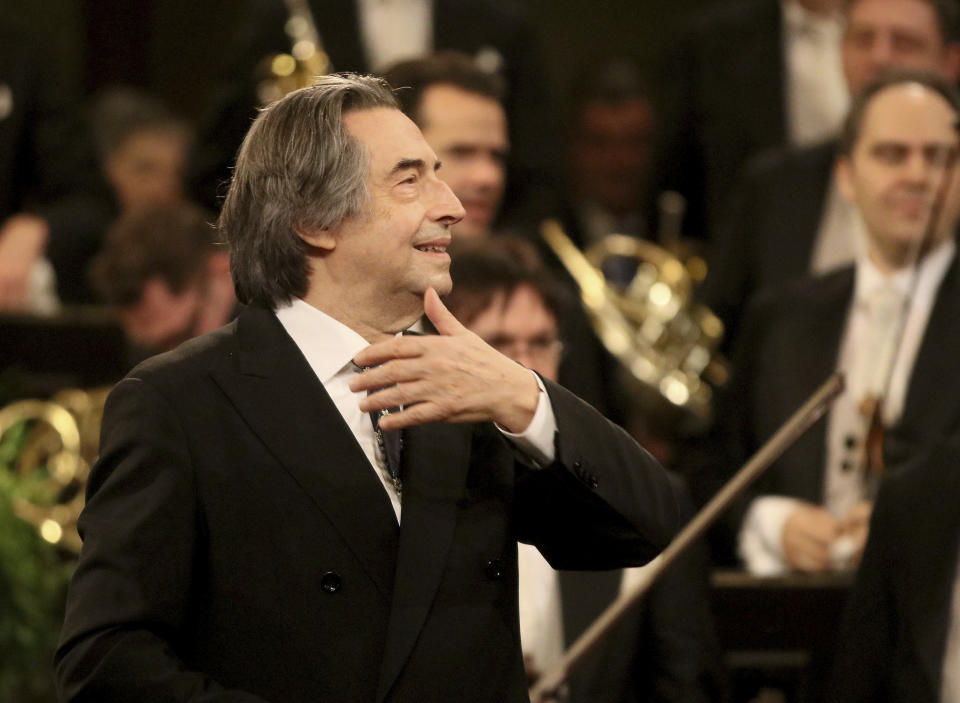 FILE - In this Jan. 1, 2018 file photo, Italian Maestro Riccardo Muti conducts the Vienna Philharmonic Orchestra during the traditional New Year's concert at the golden hall of Vienna's Musikverein, Austria. Riccardo Muti, during a concert hje held at the Ravenna Festival, Sunday, June 21, 2020, has sent a resounding message that live classical music has returned the Italian stage after the coronavirus lockdown with a full summer festival program in his adopted Ravenna. (AP Photo/Ronald Zak, File)