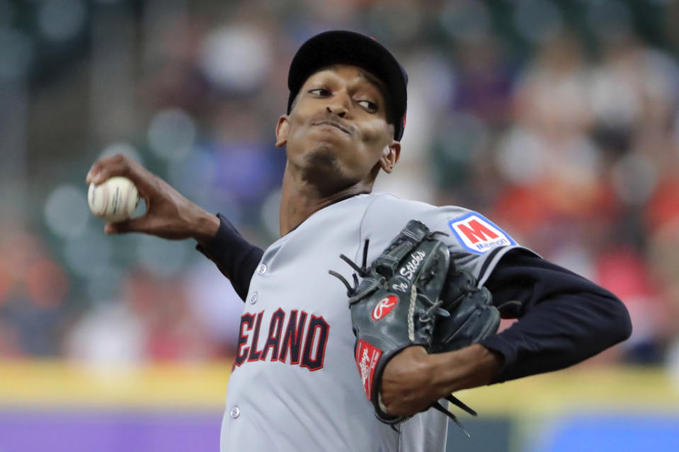 Cleveland Guardians starting pitcher Triston McKenzie throws against the Houston Astros during the first inning of a baseball game Wednesday, May 1, 2024, in Houston. (AP Photo/Michael Wyke)