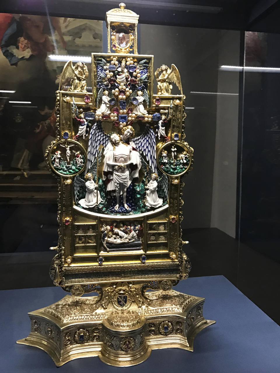 In this photo taken on Friday, March 31, 2017, a golden reliquary that was a gift from Pope Sisto V to Montalto delle Marche, a former Latin Catholic diocese, in the province of Ascoli Piceno, central Italy, is displayed at the Uffizi Gallery in Florence, Italy. The Uffizi Gallery is showing solidarity with the art-rich, quake-stricken Marche region with an exhibit of treasures saved from a series of earthquakes last year. (AP Photo/Colleen Barry)