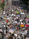 <p>Protestors march through the streets during a demonstration against the US immigration policies separating migrant families in Chicago, June 30, 2018. (Photo: Jim Young/AFP/Getty Images) </p>