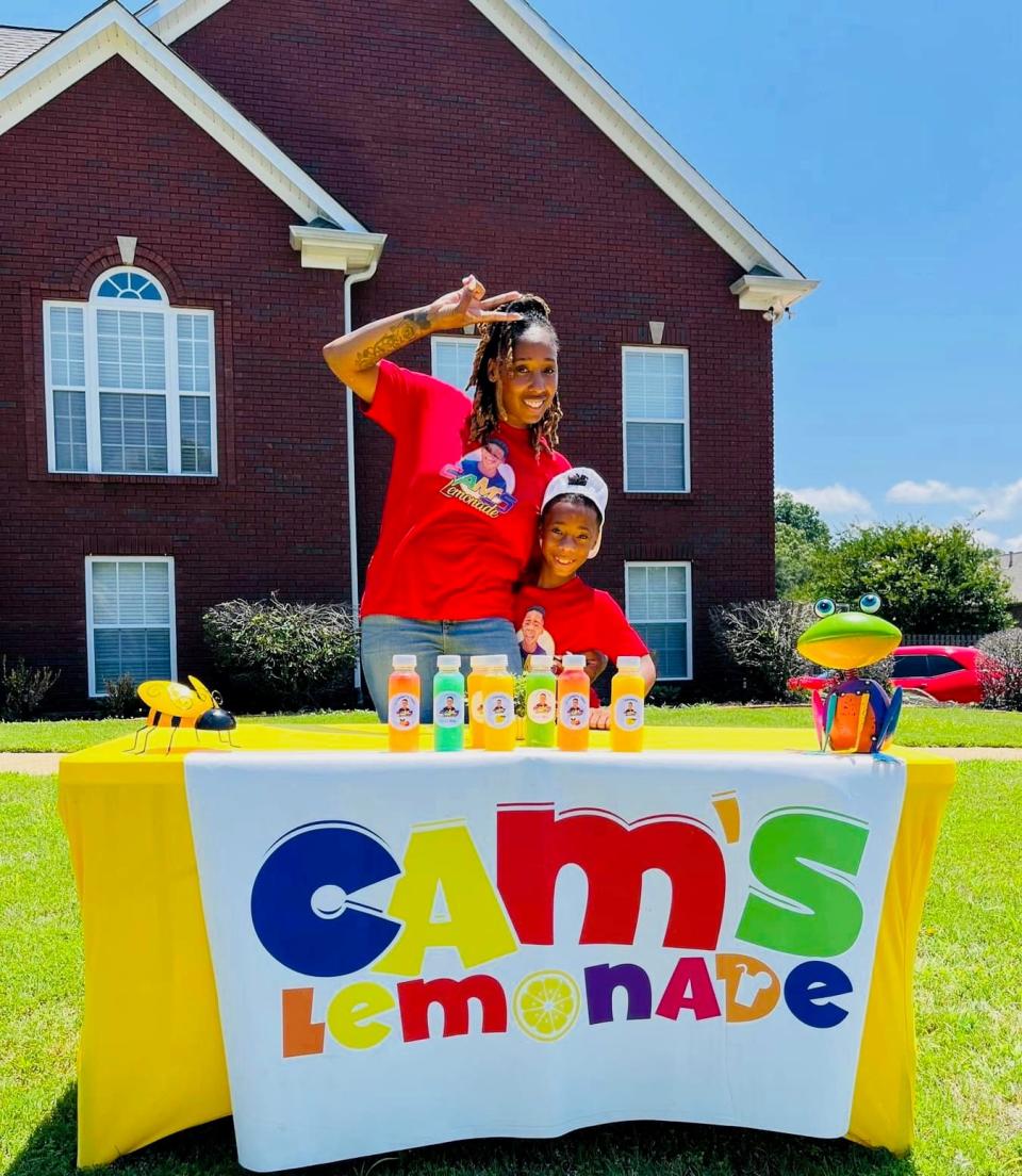 Cam Johnson and his mother, Cristal Johnson, owners of Cam's Lemonade. The business was started in 2022 when the boy was just 7 years old. His mother planned an event in June 2023 hoping to teach other kids how they do business, but someone called the U.S. Department of Labor and complained that the company was hiring minors.