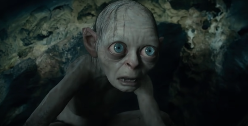 Gollum looks at Bilbo