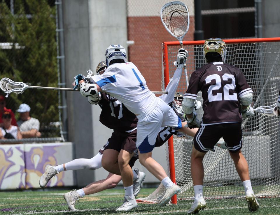 Fremont’s Owen Hill (1) scores the second overtime game-winning goal against Davis in the 6A boys lacrosse state semifinal in Salt Lake City on Wednesday, May 24, 2023. | Jeffrey D. Allred, Deseret News
