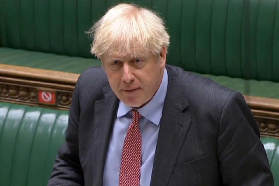 Prime Minister Boris Johnson speaks during PMQs (AFP via Getty Images)