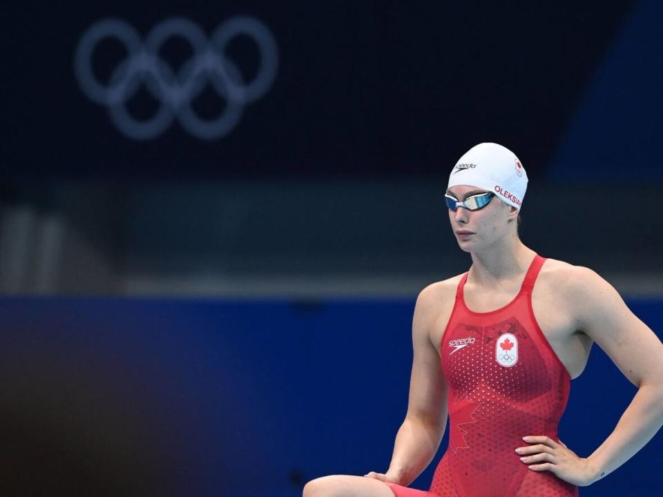 Canada's Penny Oleksiak, seen above at Tokyo 2020, is returning to competition at the Canadian Open, where she says she feels healthy and happy to be swimming after bouts of injury and depression. (Attila Kisbenedek/AFP via Getty Images - image credit)