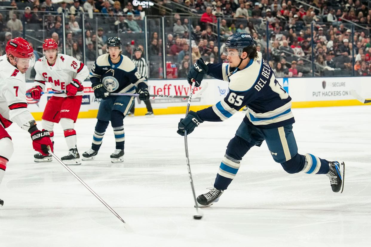 Apr 16, 2024; Columbus, Ohio, USA; Columbus Blue Jackets center Luca Del Bel Belluz (65) scores a goal on his first shift during the first period of the NHL hockey game against the Carolina Hurricanes at Nationwide Arena.