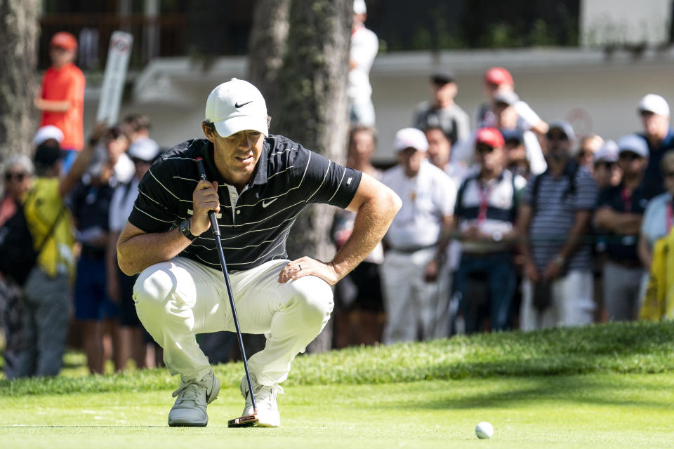 Rory McIlroy of Northern Ireland lines up a putt during the second round of the European Masters golf tournament in Crans-Montana, Switzerland, Friday, Aug. 30, 2019. (Alexandra Wey/Keystone via AP)