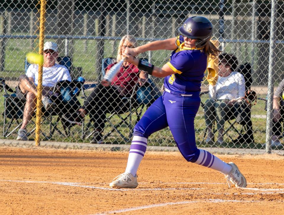 Union County's Mia Kent (6) connects with a pitch against North Marion in an April 25 game.