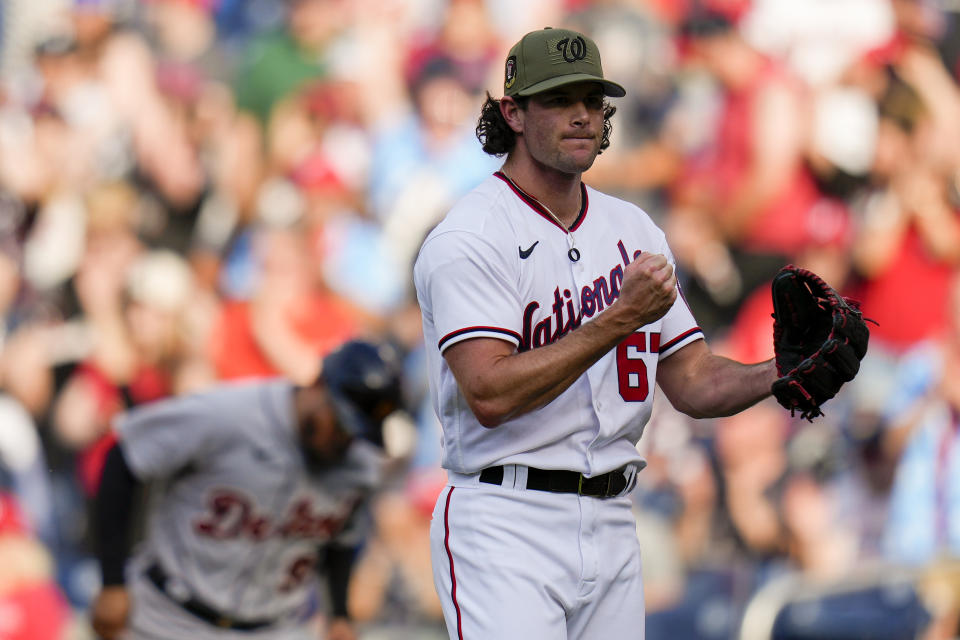 Washington Nationals relief pitcher Kyle Finnegan celebrates after the last out of a baseball game against the Detroit Tigers at Nationals Park, Saturday, May 20, 2023, in Washington. (AP Photo/Alex Brandon)