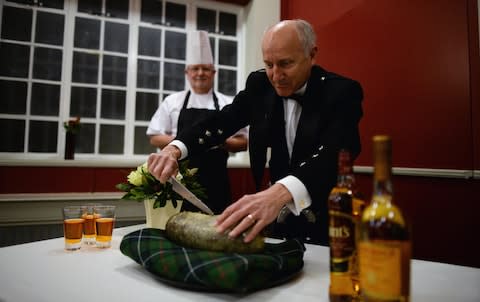 A group re-enact the first ever Burns Supper - Credit: GETTY