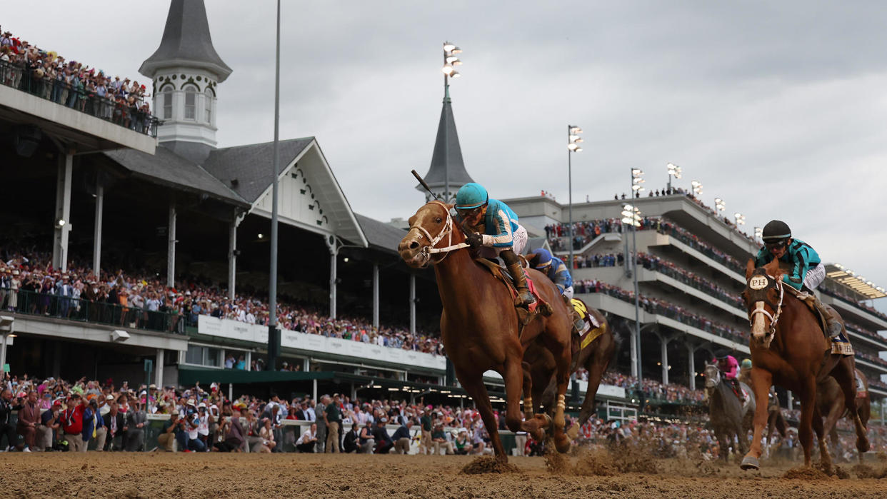 Mage, ridden by jockey Javier Castellano, crosses the finish line to win the 149th running of the Kentucky Derby at Churchill Downs, May 6, 2023, in Louisville, Kentucky. / Credit: Michael Reaves/Getty Images