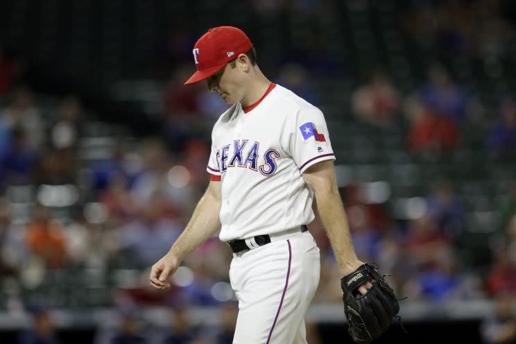 It's been a rough year for Rangers pitcher Sam Dyson. (AP Photo)