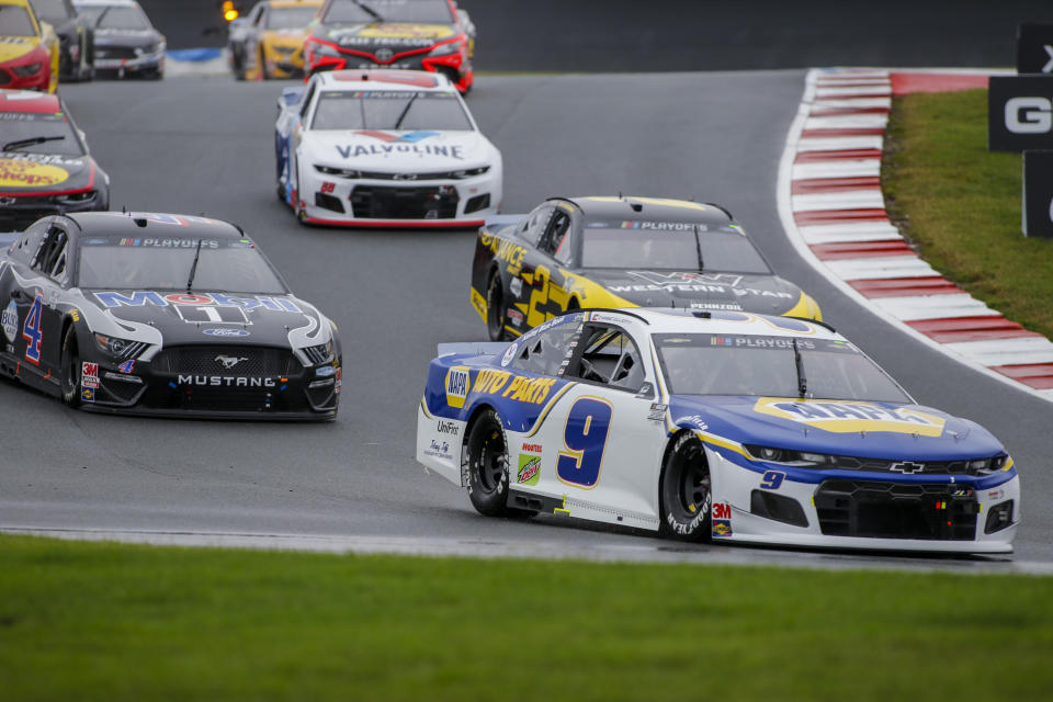 Chase Elliott leads the way out of turn 7 as he competes in a NASCAR Cup Series auto race at Charlotte Motor Speedway in Concord, N.C., Sunday, Oct. 11, 2020. Elliott won the race. (AP Photo/Nell Redmond)