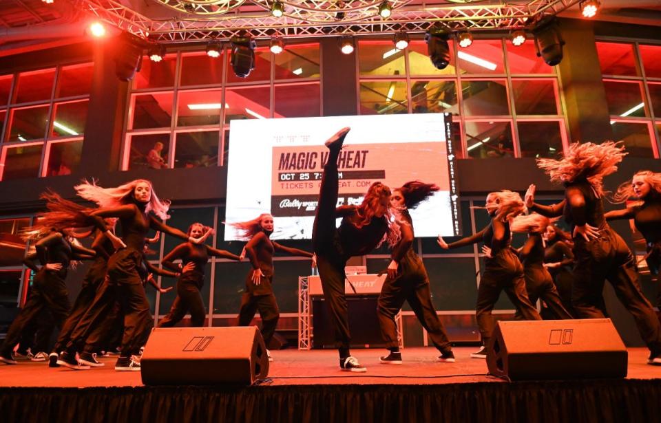 Jupiter High's Dance Team performing during half time at The Miami Heat's opening night.