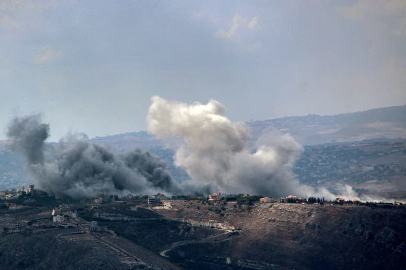 Smoke from heavy Israeli airstrikes rises from the southern Lebanese village of Jabal al-Rihan. Powerful airstrikes were carried out across much of southern Lebanon. Lebanon's Health Ministry said 182 people were killed and more than 700 wounded in what would be Lebanon's deadliest day since the conflict began in October. Marwan Naamani/ZUMA Press Wire/dpa