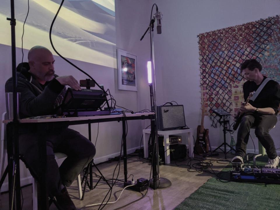 Matthew Poppa (left) and Tony Irons perform during "An Evening of Synthesis" March 27 at stop-gap projects