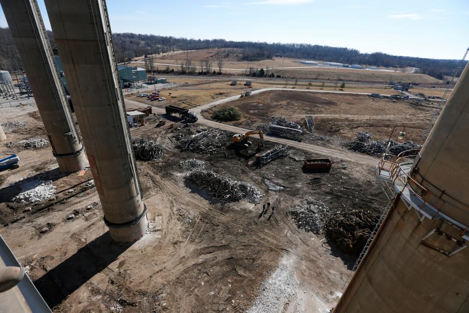 Construction crews demolish equipment at the James River Power Station on Monday, Jan. 31, 2022. The smokestacks at the decommissioned power plant are set to be imploded later this month. 