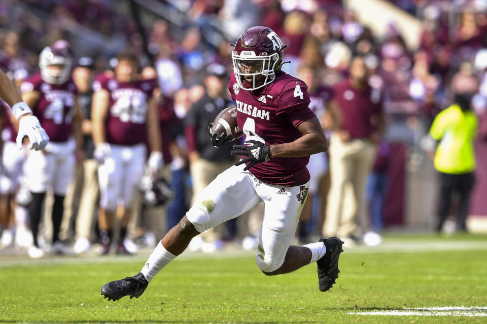 Nov 20, 2021; College Station, Texas; Texas A&M Aggies running back Amari Daniels (4) runs the ball for a touchdown fourth quarter against the Prairie View Am Panthers at Kyle Field. Maria Lysaker-USA TODAY Sports