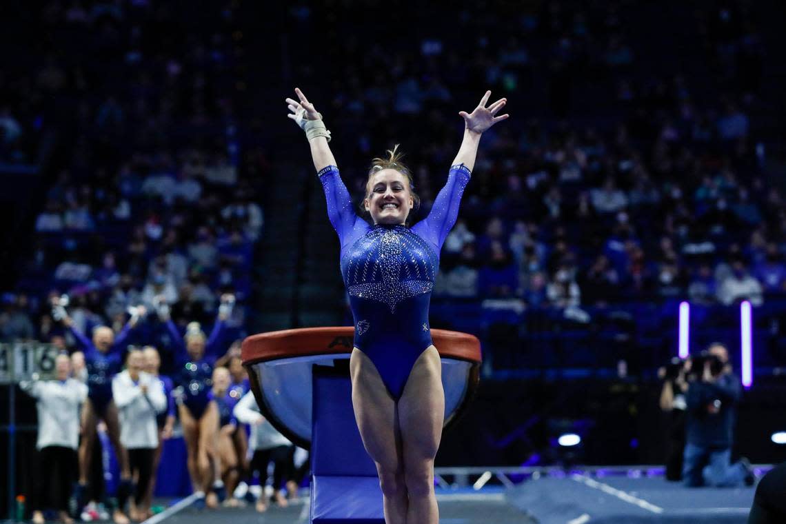 Raena Worley poses after finishing a turn on the vault during Kentucky’s Excite Night meet in January 2022 in Rupp Arena. Worley was named all-around champion of the meet.