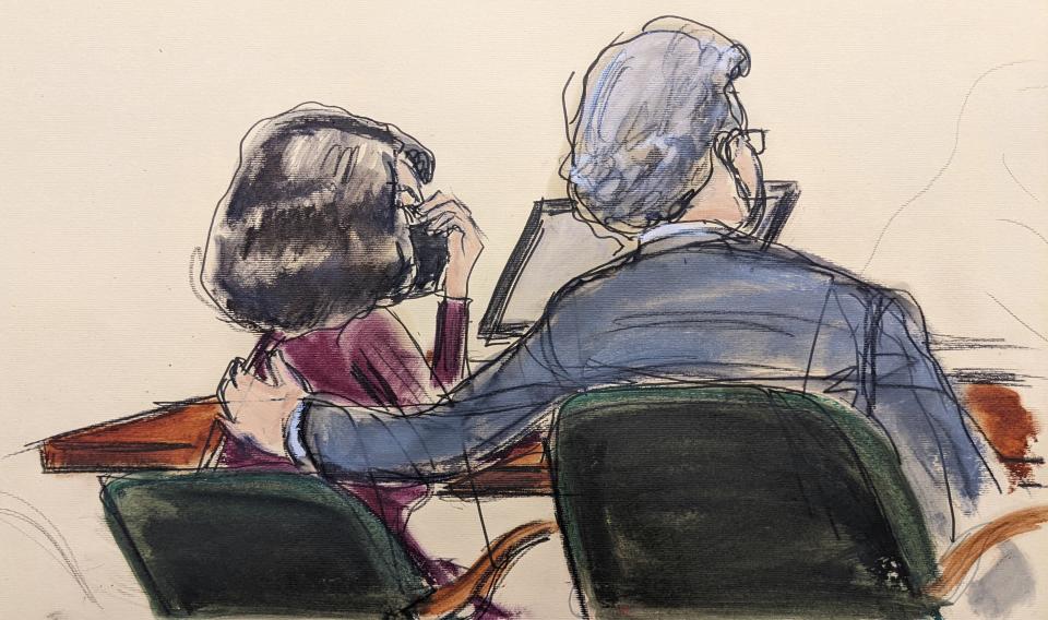 This courtroom sketch shows Ghislaine Maxwell, left, as she puts her hand up to her face, listening with her lawyer Jeffrey Pagliuca, as a jury returns a guilty verdict in her sex trafficking trial, Wednesday Dec. 29, 2021, in New York. (Elizabeth Williams via AP)