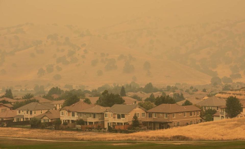 Diablo Gande community near Patterson is covered with dense smoke due to the SCU Lightning Complex fire on Thursday, Aug. 20, 2020.