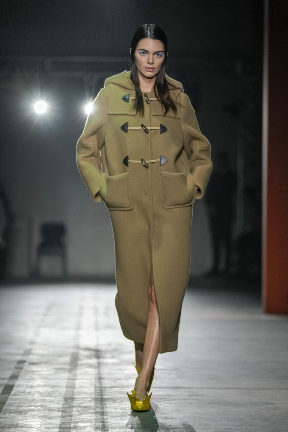 Kendall Jenner wears a creation as part of the Prada women's Fall-Winter 2023-24 collection presented in Milan, Italy, Thursday, Feb. 23, 2023. (AP Photo/Luca Bruno)