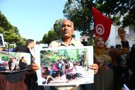 <p>Tunisian demonstrators hold banners during their protest against Myanmar’s oppression towards Rohingya Muslims, on Avenue Habib Bourguiba in Tunis, Tunisia, Sept. 8, 2017. (Photo: Yassine Gaidi/Anadolu Agency/Getty Images) </p>