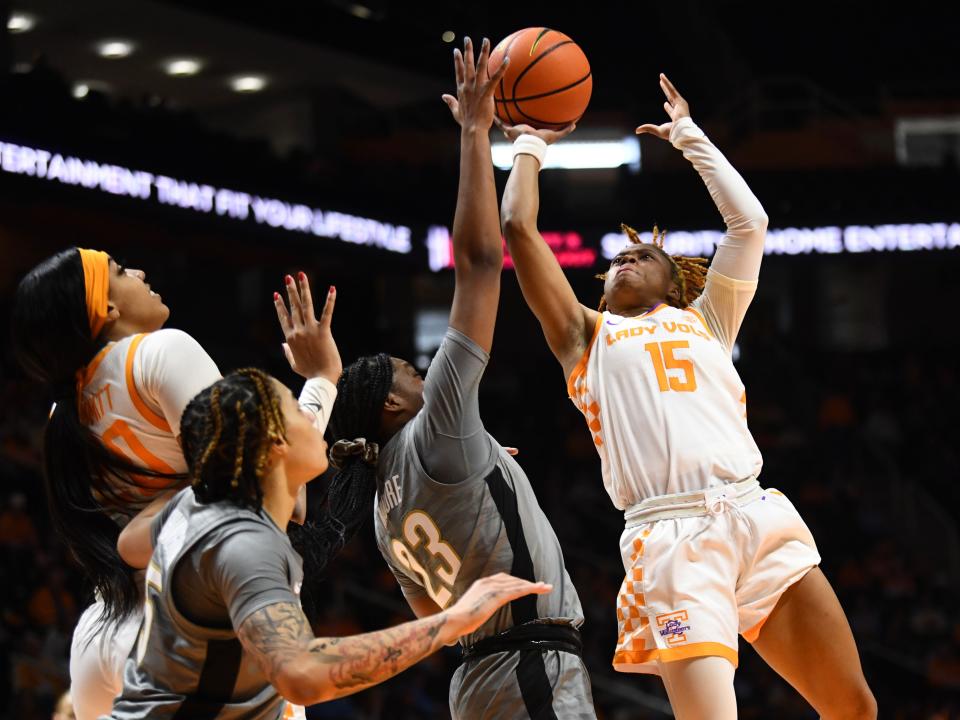 Tennessee's Jasmine Powell (15) get a shot off during an NCAA college basketball game against Vanderbilt on Sunday, January 21, 2024 in Knoxville, Tenn.