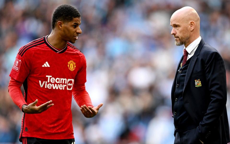 Marcus Rashford speaks to Erik ten Hag