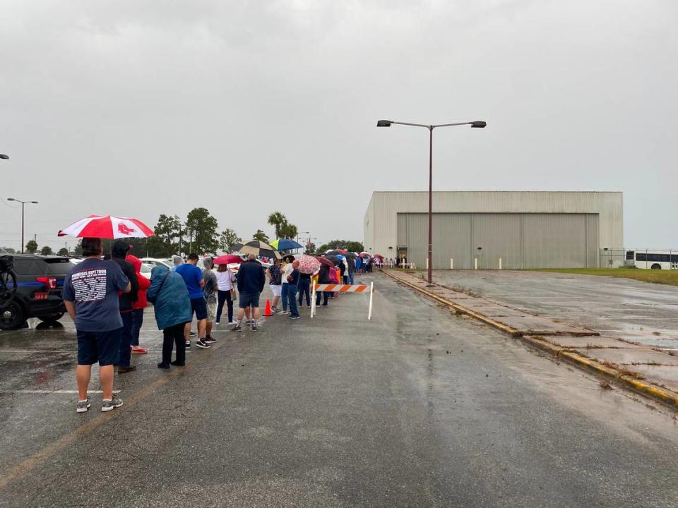 President Donald Trump supporters line up outside the Tallahassee International Airport to attend a rally hosted by Vice President Mike Pence on Saturday Oct. 24, 2020.