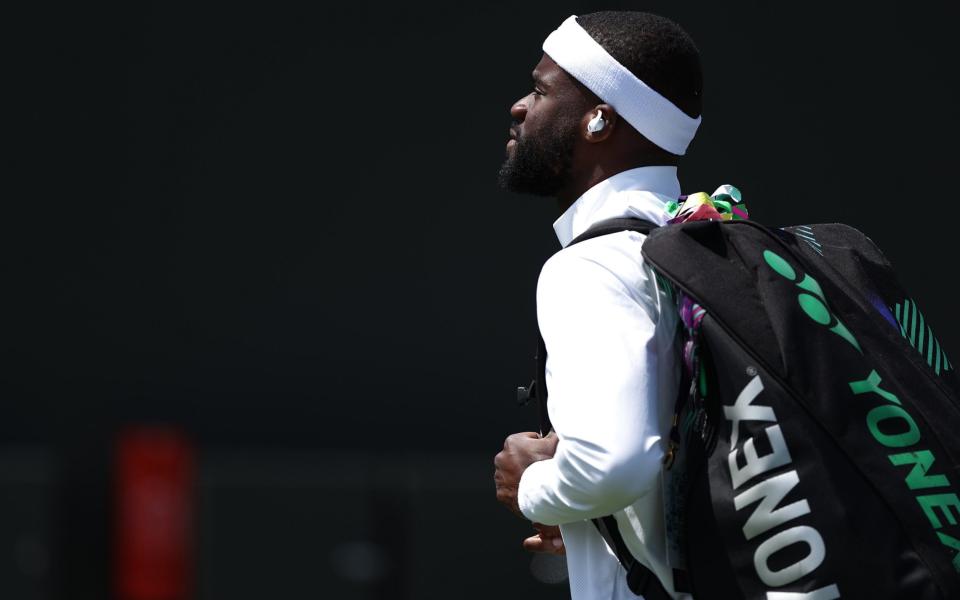 Frances Tiafoe of USA enters the court for his Men&#39;s Singles 1st round match against Yibing Wu of China at the Wimbledon Championships, Wimbledon