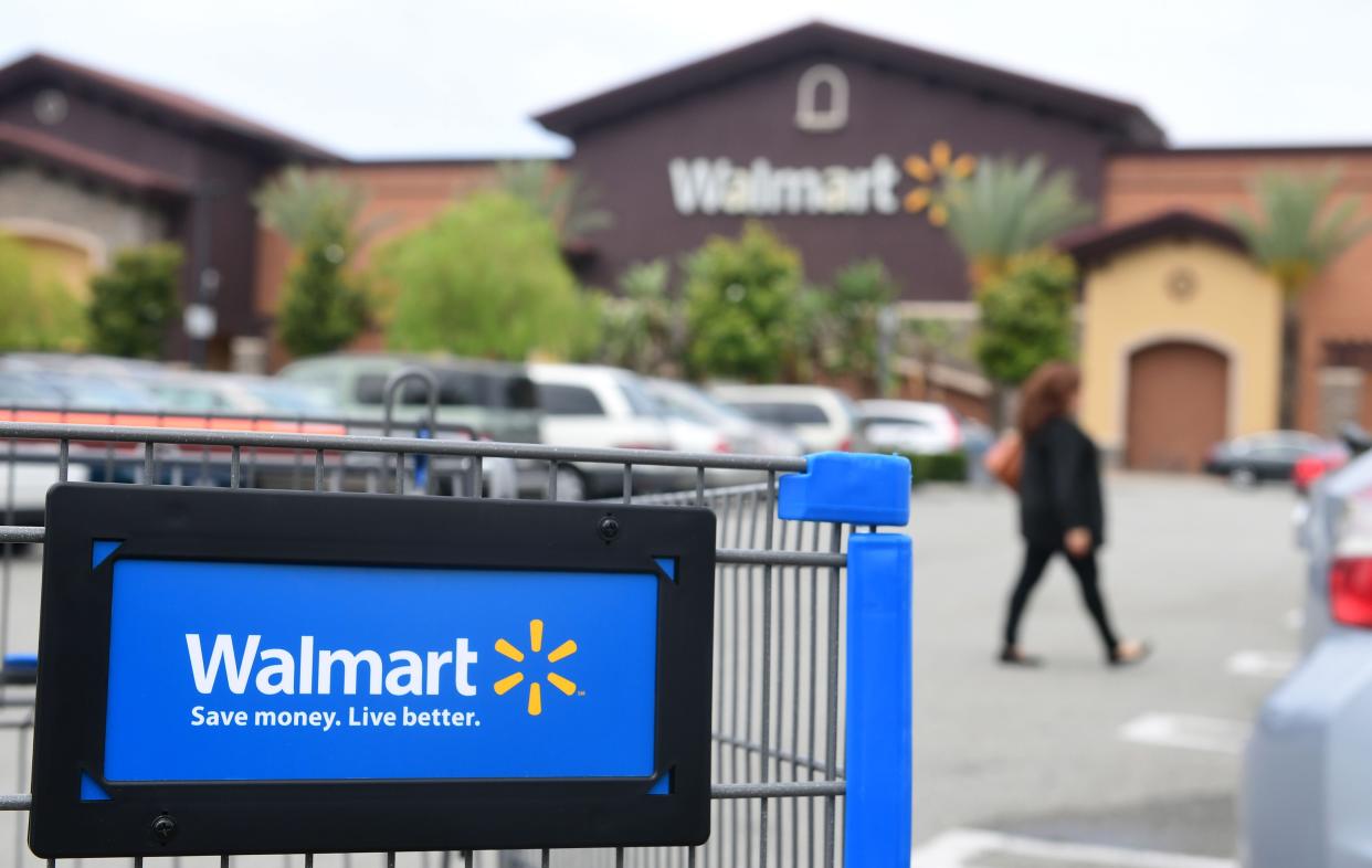 A Walmart cart in a parking lot