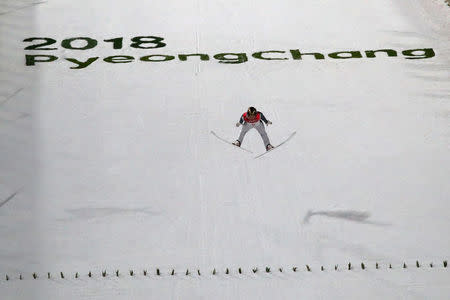 Ski Jumping – Pyeongchang 2018 Winter Olympics – Men’s Normal Hill Individual Final – Alpensia Ski Jumping Centre - Pyeongchang, South Korea – February 10, 2018 - Alexey Romashov, an Olympic athlete from Russia, competes. REUTERS/Carlos Barria