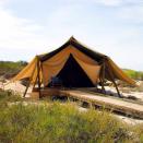 Each tent sits on a cliff just off the breathtaking beach. Sea kayaking and snorkeling are also available for guests to enjoy.