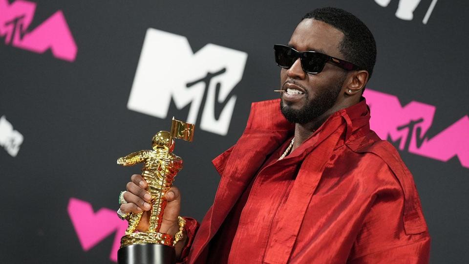 Diddy appears on a red carpet