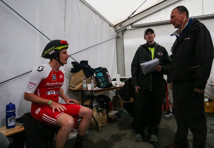<span class="article__caption">Race Referee Paul Lester speaks to Alistair Brownlee in the transition area prior to the start of Ironman Ireland.</span> (Photo: Huw Fairclough/Getty Images)
