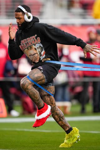 <p>Thearon W. Henderson/Getty</p> Odell Beckham Jr. of the Baltimore Ravens warms up prior to a game against the San Francisco 49ers at Levi's Stadium on December 25, 2023 in Santa Clara, California.