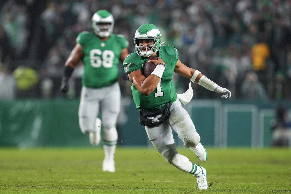 PHILADELPHIA, PENNSYLVANIA – NOVEMBER 26: Jalen Hurts #1 of the Philadelphia Eagles runs the ball during the first quarter against the Buffalo Bills at Lincoln Financial Field on November 26, 2023 in Philadelphia, Pennsylvania. (Photo by Mitchell Leff/Getty Images)