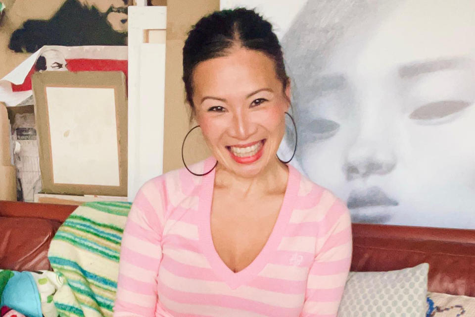 Poh Ling Yeow in a pink striped top