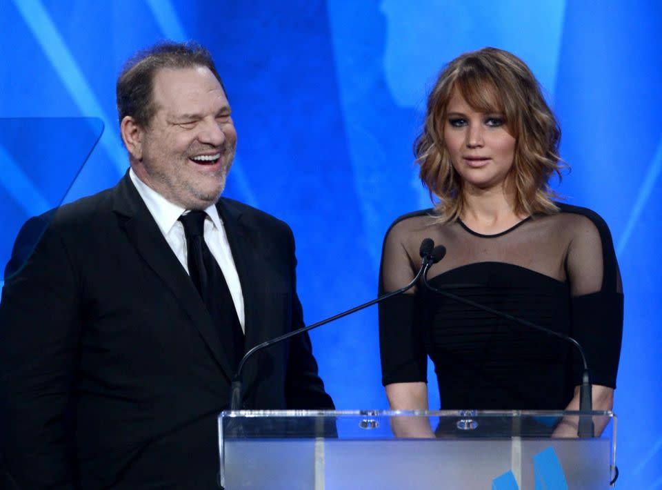 JLaw, pictured here with Weinstein in 2013, revealed she did have some unwarranted touching and attention from Hollywood execs. Source: Getty