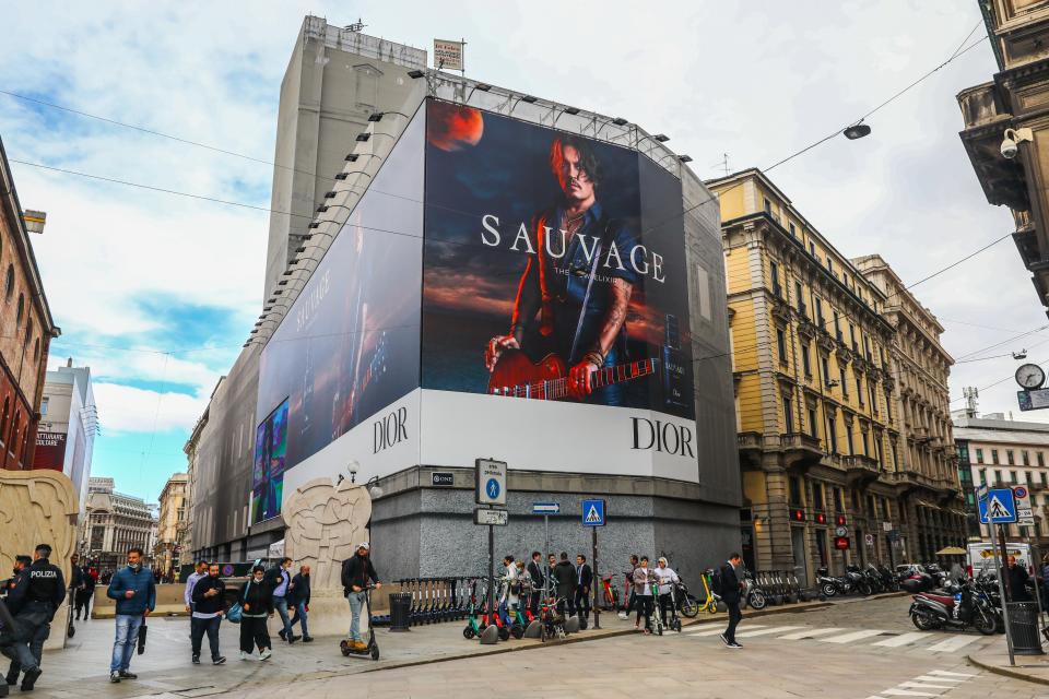 Giant advertisement on a building featuring Johnny Depp