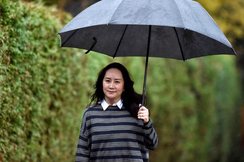 FILE PHOTO: Huawei Technologies Chief Financial Officer Meng Wanzhou leaves her home to attend a court hearing in Vancouver