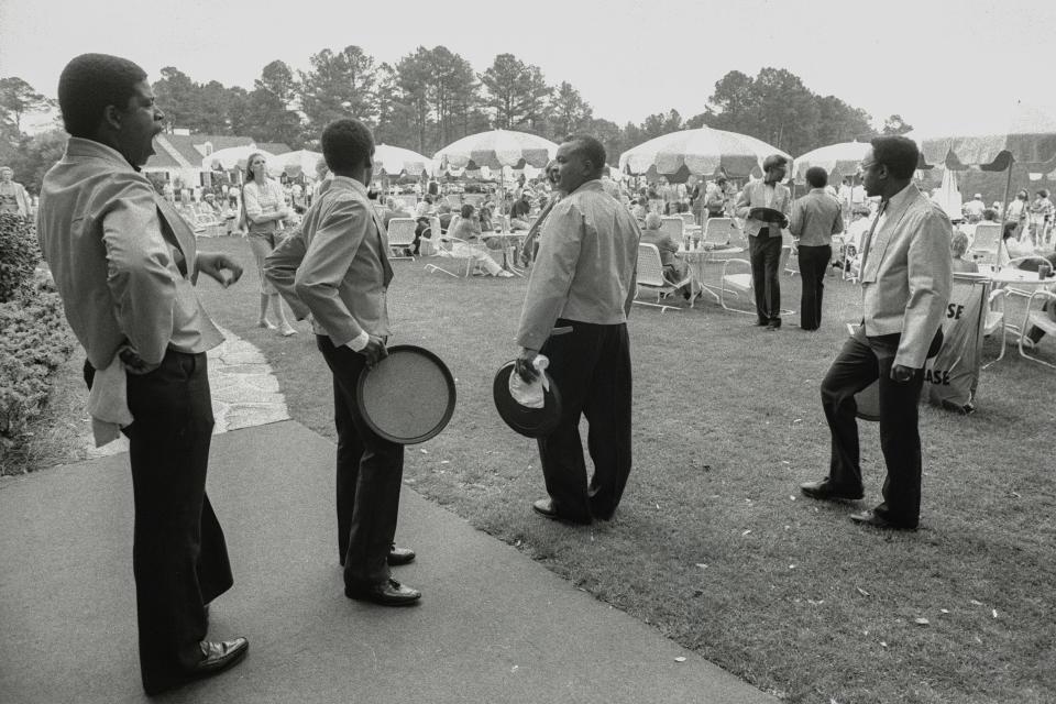 04/09/1981; Augusta, Georgia, USA; Outdoor dining area and waiters at Augusta National Golf Club during the 1981 Masters.