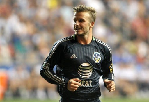 Football icon David Beckham, pictured here in July, says he will play his final game with the Los Angeles Galaxy when the Major League Soccer club hosts the league championship early next month