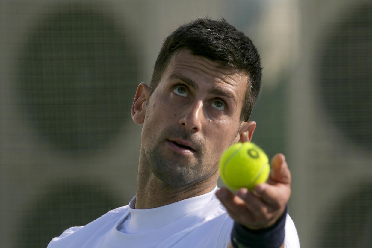 Serbian tennis player Novak Djokovic serves the ball during his open practise session in Belgrade, Serbia, Wednesday, Feb. 22, 2023. Djokovic said Wednesday he still hopes US border authorities would allow him entry to take part in two ATP Masters tennis tournaments despite being unvaccinated against the coronavirus. (AP Photo/Darko Vojinovic)