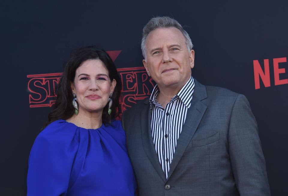 US actor Paul Reiser and his wife Paula Ravets attend Netflix's "Stranger Things 3" premiere at Santa Monica high school Barnum Hall on June 28, 2019 in Santa Monica, Calif.