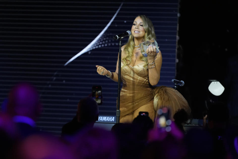 Five-time Grammy winner Mariah Carey receives the Recording Academy Global Impact Award at the third annual Recording Academy Honors Presented By The Black Music Collective at the third annual Recording Academy Honors Presented by The Black Music Collective in Los Angeles, Thursday, Feb. 1, 2024. (AP Photo/Damian Dovarganes)