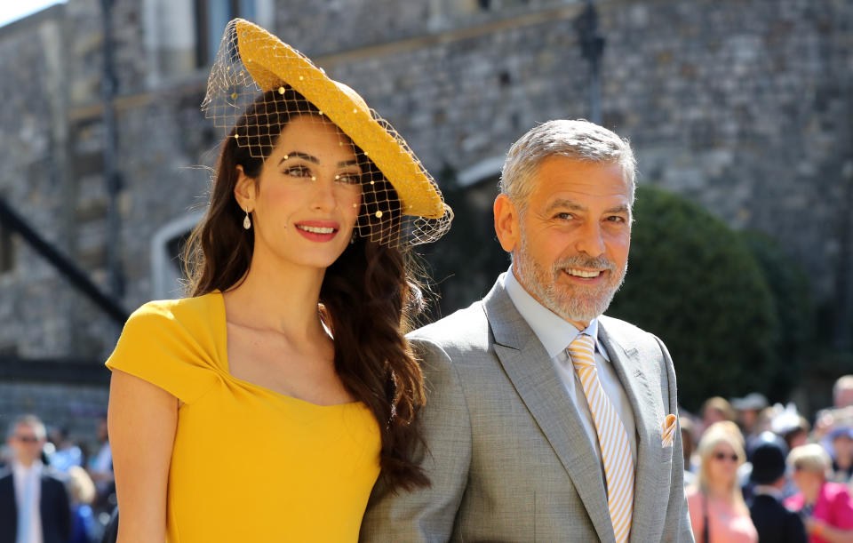 Amal and George Clooney arrive at the royal wedding (Picture: PA)