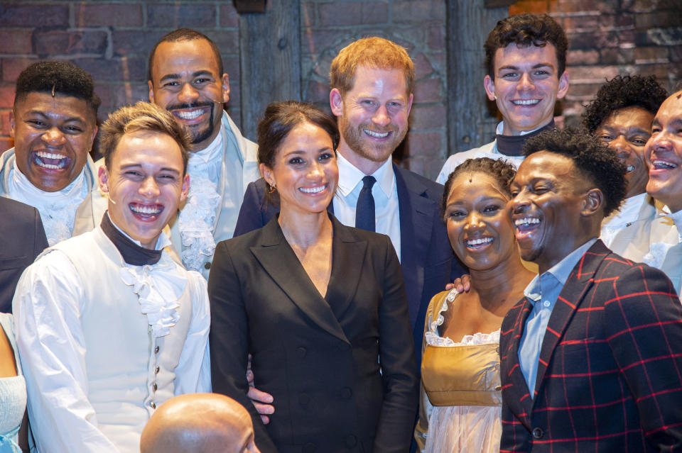 The Duke and Duchess of Sussex with the cast of “Hamilton.” Image via Getty Images.